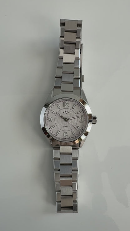 demonstration of silver watch with white face